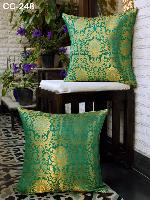 Artisan embroidered cushion cover with detailed floral pattern