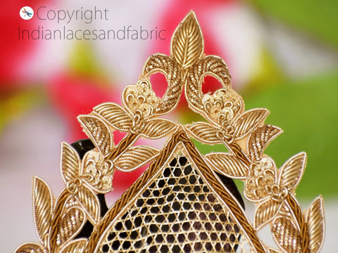 Four handmade gold Zardozi patches arranged artistically on board for craft showcase — ideal for fashion customisation or dressmaking supplies