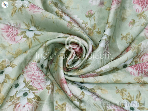 soft light weight floral print Georgette Satin fabric has Pista Green, Salmon Pink and White Fabric