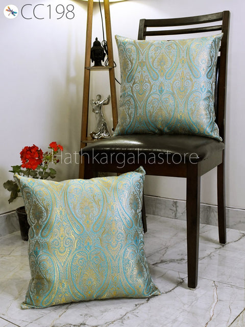 Decorative turquoise blue and gold silk throw pillow cover, traditional Indian brocade textile, perfect for home décor gifts.