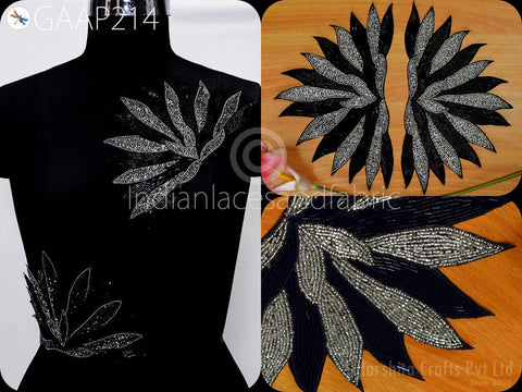 Appliqué’s outer petals, featuring black and silver beads in gradient shading for depth and craftsmanship visibility.