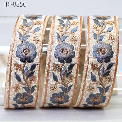 Blue thread embroidery on ivory Dupioni base fabric