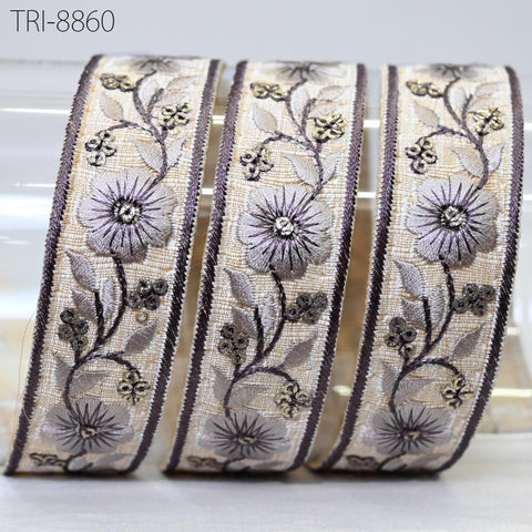 Blue thread embroidery on ivory Dupioni base fabric