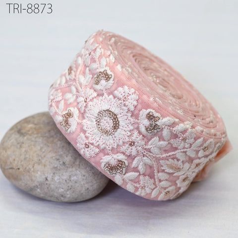 Pink Net base fabric, white thread embroidery