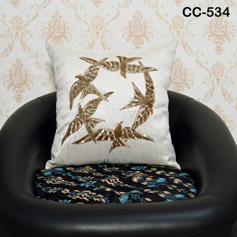 Elegant Dupioni pure silk cushion cover with a subtle sheen and natural texture, shown in Ivory on a sofa or chair.