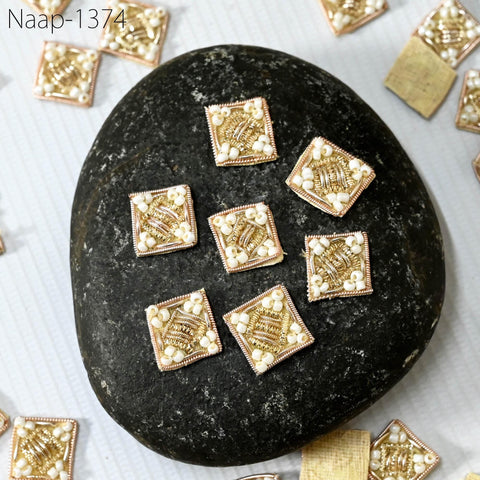 dull gold appliques