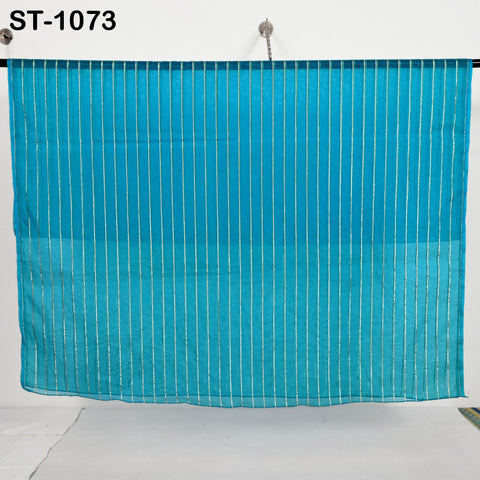 Bright turquoise blue organza dupatta with vertical metallic silver zari stripes, displayed hanging neatly for a full view of its sheer and lightweight texture