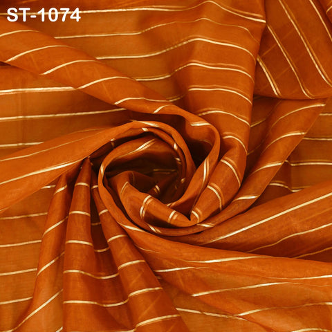Elegant Burnt orange-colored dupatta in sheer organza with metallic gold zari lines, perfect for festive or bridal attire.