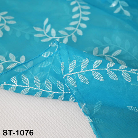 Turquoise blue organza dupatta with delicate white embroidered leaf patterns, sheer and lightweight, perfect for Indian wedding or festive wear.