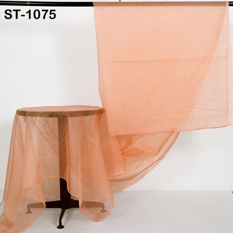 Peach organza dupatta with fine vertical gold stripes, sheer and lightweight, draped on a table and hanging elegantly, perfect for Indian bridal and festive wear.