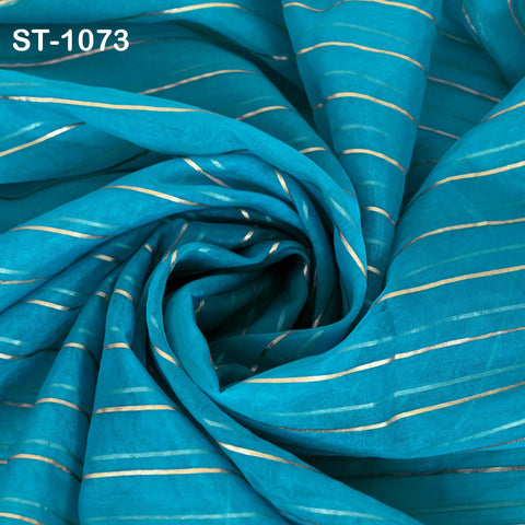Bright turquoise blue organza dupatta with vertical metallic silver zari stripes, displayed hanging neatly for a full view of its sheer and lightweight texture