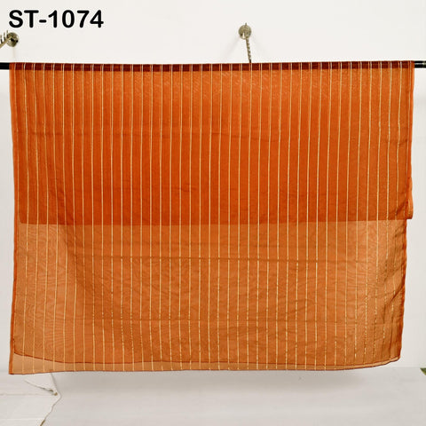 Translucent organza veil in burnt orange with gold accents, ideal for wedding or festive looks