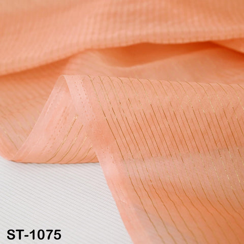 ST-1075 peach sheer dupatta with gold detailing, displayed hanging and draped, ideal for lehengas, sarees, or gifting.