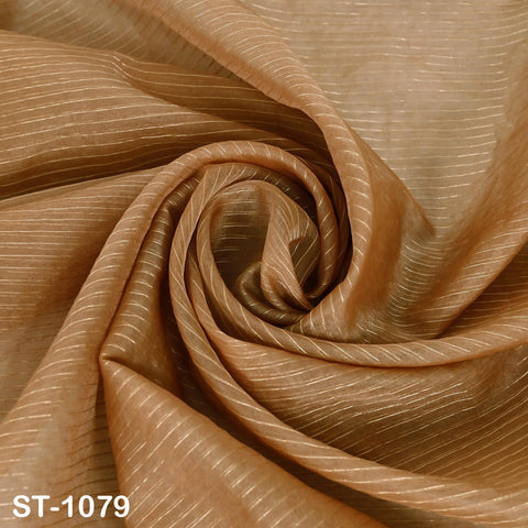 Light brown organza dupatta with gold sheen, displayed draped on a table and hanging vertically, ideal for Indian bridal wear or festive costumes.