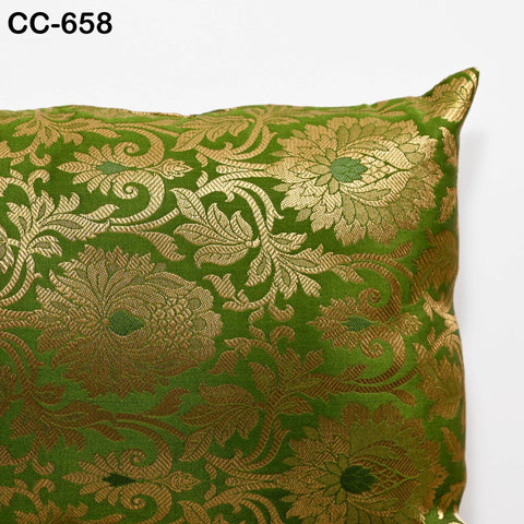 Handcrafted Banarasi silk rectangle cushion cover in green with gold floral brocade motifs.