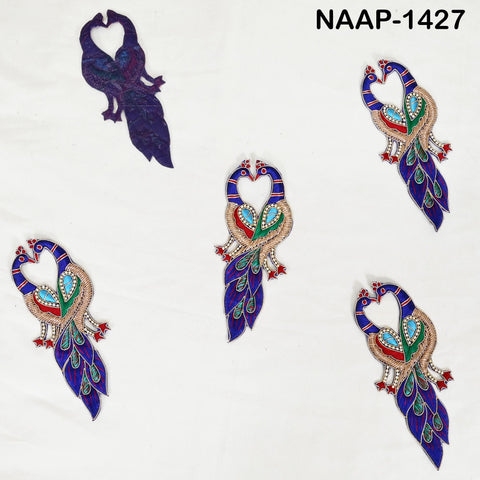 2 Pair peacock embroidery patches laid out flat to show texture, shine and craftsmanship in gold and jewel tones.