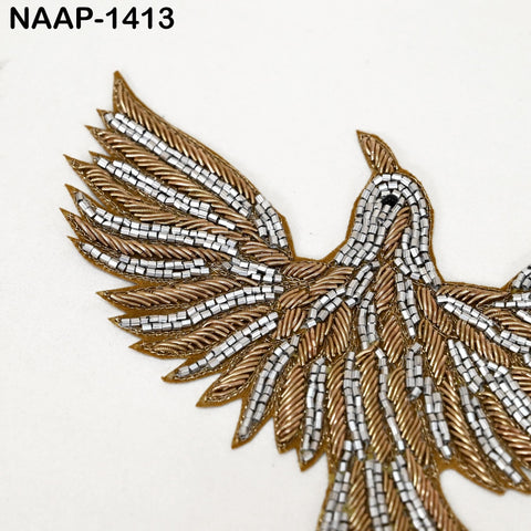 Bird appliqué showing detailed gold zari thread and sequins, embellished with grey beads, handmade patch.