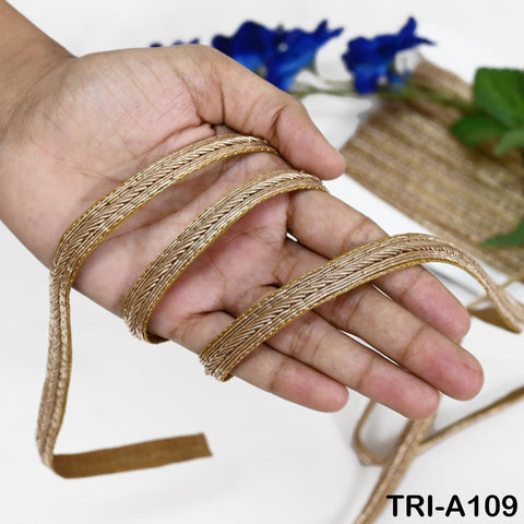 9 yards antique gold zari lace trim with hand-embroidered metallic threads on cotton base, ideal for saree borders and dress embellishments.