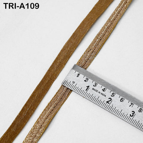 Antique gold lace border with ruler showing 1.5 cm width, perfect for dress and dupatta edging