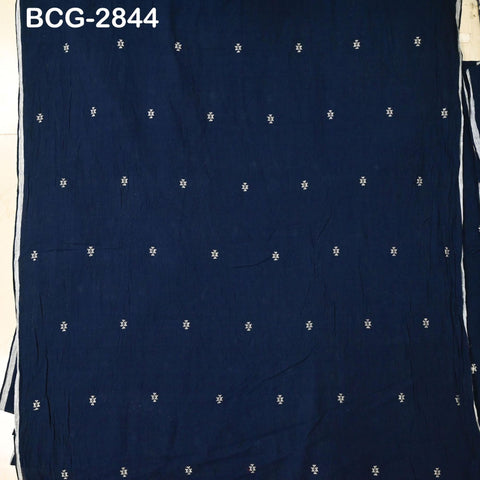 The image is a close-up of a dark blue fabric with small white dots or stars scattered across it.