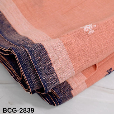 A close-up image of a fabric with a striped pattern in shades of orange and blue.