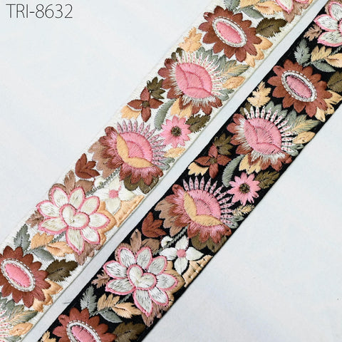 two decorative fabric pieces with floral patterns. The left piece has a floral design with pink and green flowers, while the right piece has a floral design with brown and green flowers. The text "TRI-8632" is visible in the image.