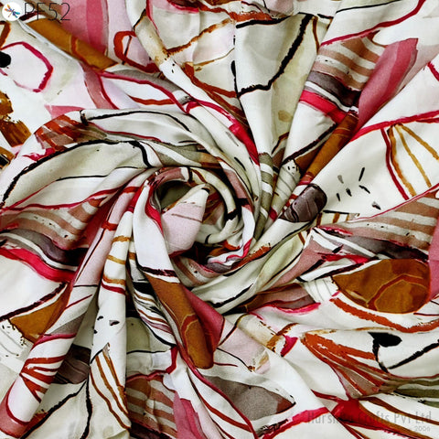 The image is a close-up of a colorful, abstract fabric with a swirling pattern of red, white, and brown colors.