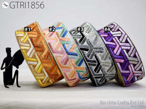 a collection of colorful, patterned fabric pieces arranged in a row, with each piece having a unique design and color.