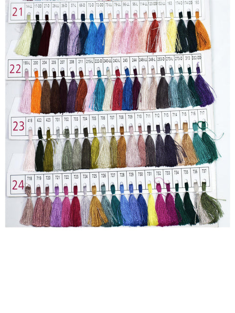 a collection of various colored tassels or strings, each with a unique color and pattern, arranged in rows and columns. The tassels are hanging from a white background, creating a visually appealing and organized display.