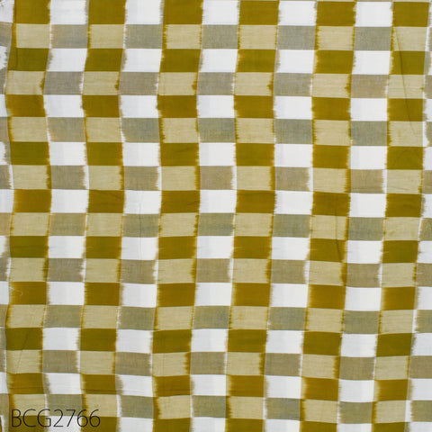 The image is a close-up of a fabric with a repeating pattern of yellow and white squares, creating a checkered or striped design.