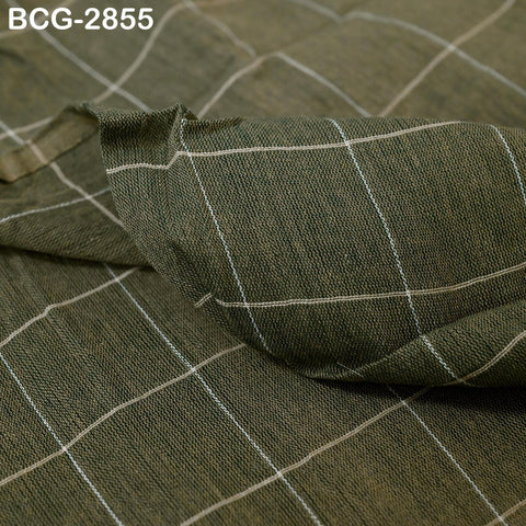 a close-up view of a fabric with a checkered pattern, featuring a diagonal grid of white lines.