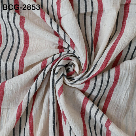a close-up view of a fabric with a striped pattern in red, black, and white. The fabric appears to be made of cotton and has a textured appearance.
