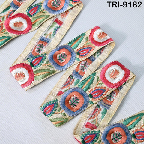 a collection of colorful, patterned fabric pieces arranged in a zigzag pattern on a white background.