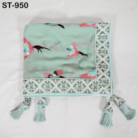 A light green fabric with a floral pattern and a decorative border, featuring a repeating design of pink and black birds.