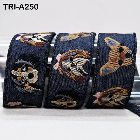A close-up image of a decorative ribbon with a repeating pattern of dog faces in various colors and styles.