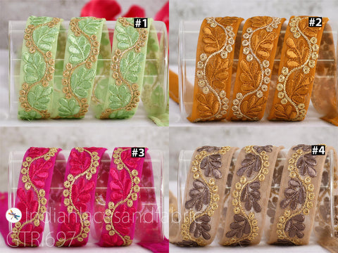 The image is a collage of four images showing different colored and patterned ribbons with gold leaf designs.