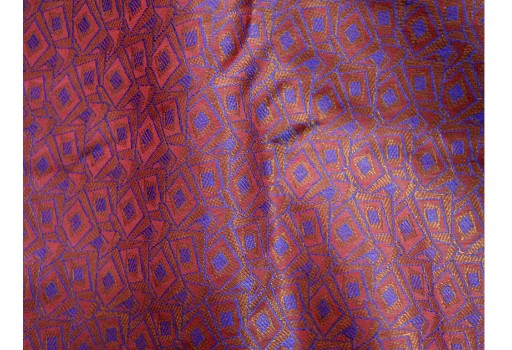 Fabric illustrate blue and golden woven geometrical pattern maroon brocade blended silk Indian banarasi fabric by the yard bridal costume material mats brocade