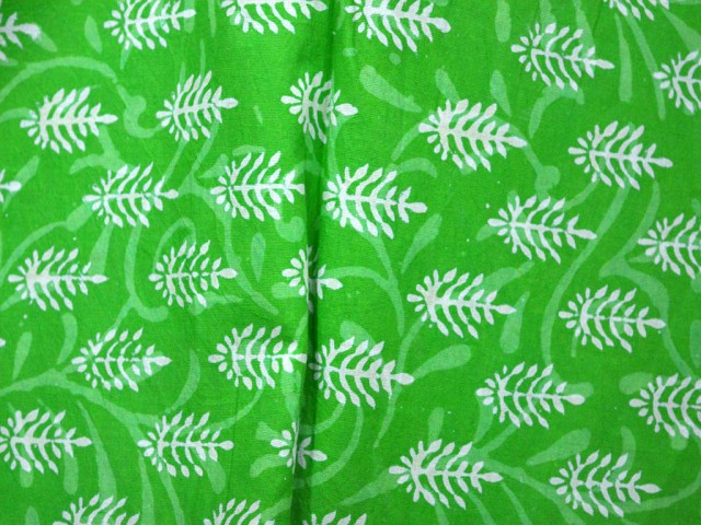 Fabric in Parrot green and White Color printed cotton 