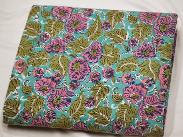 Use our hand block print cotton fabric for making clutches.