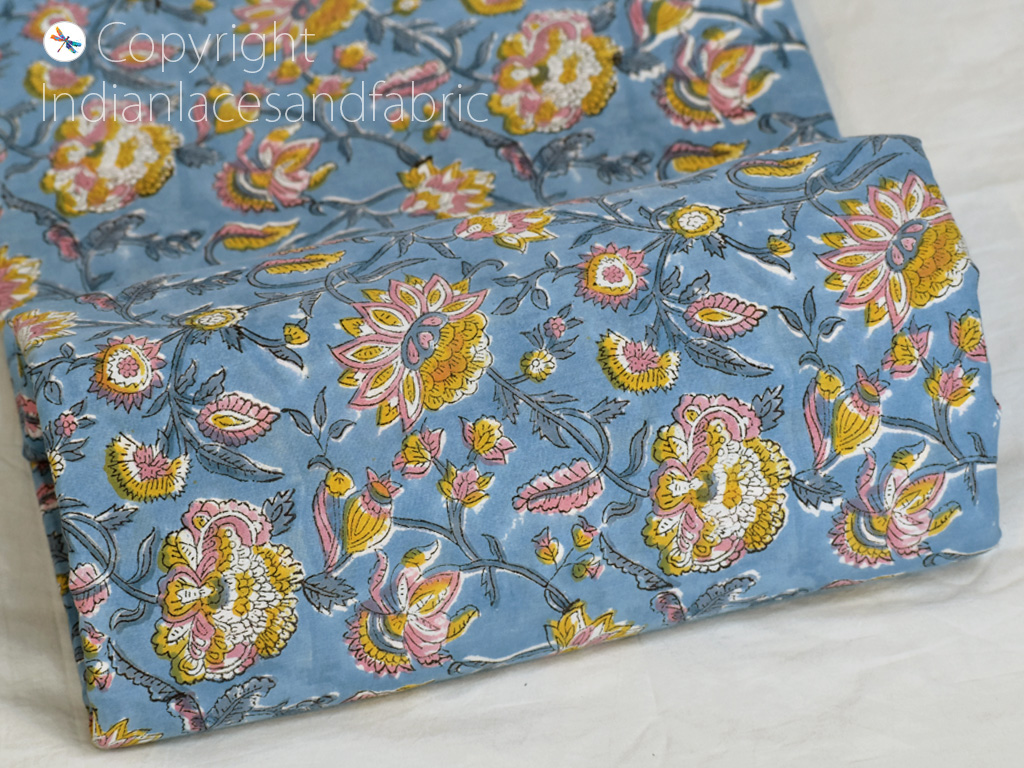 The block printed cotton fabric is made of fabric for easy stitching